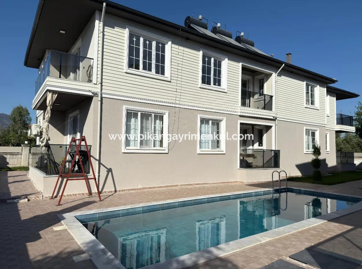 1 1 Wohnung Mit Pool Zu Verkaufen In Ortaca Cumhuriyet