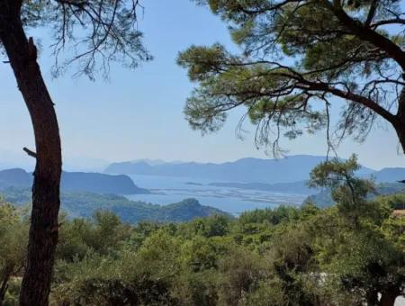 Ein Freistehendes 762 M² Großes Grundstück, Das Sich Für Investitionen Mit Natur- Und Meeresblick In Muğla Ortaca Gökbel Eignet, Steht Zum Verkauf