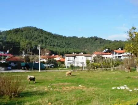 Grundstück Zu Verkaufen In Göcek In Der Nähe Des Strandes, Mit Einem Projekt Inlice