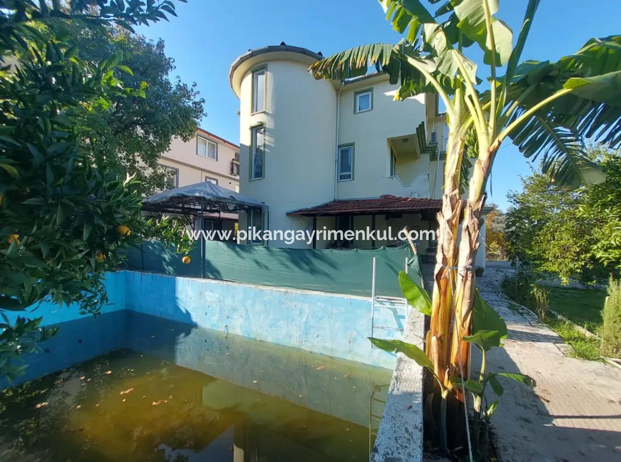 A House With 4 1 And 3 1 Swimming Pools On 645 M2 Land In Ortaca Kemaliye Is For Sale Or Exchange.
