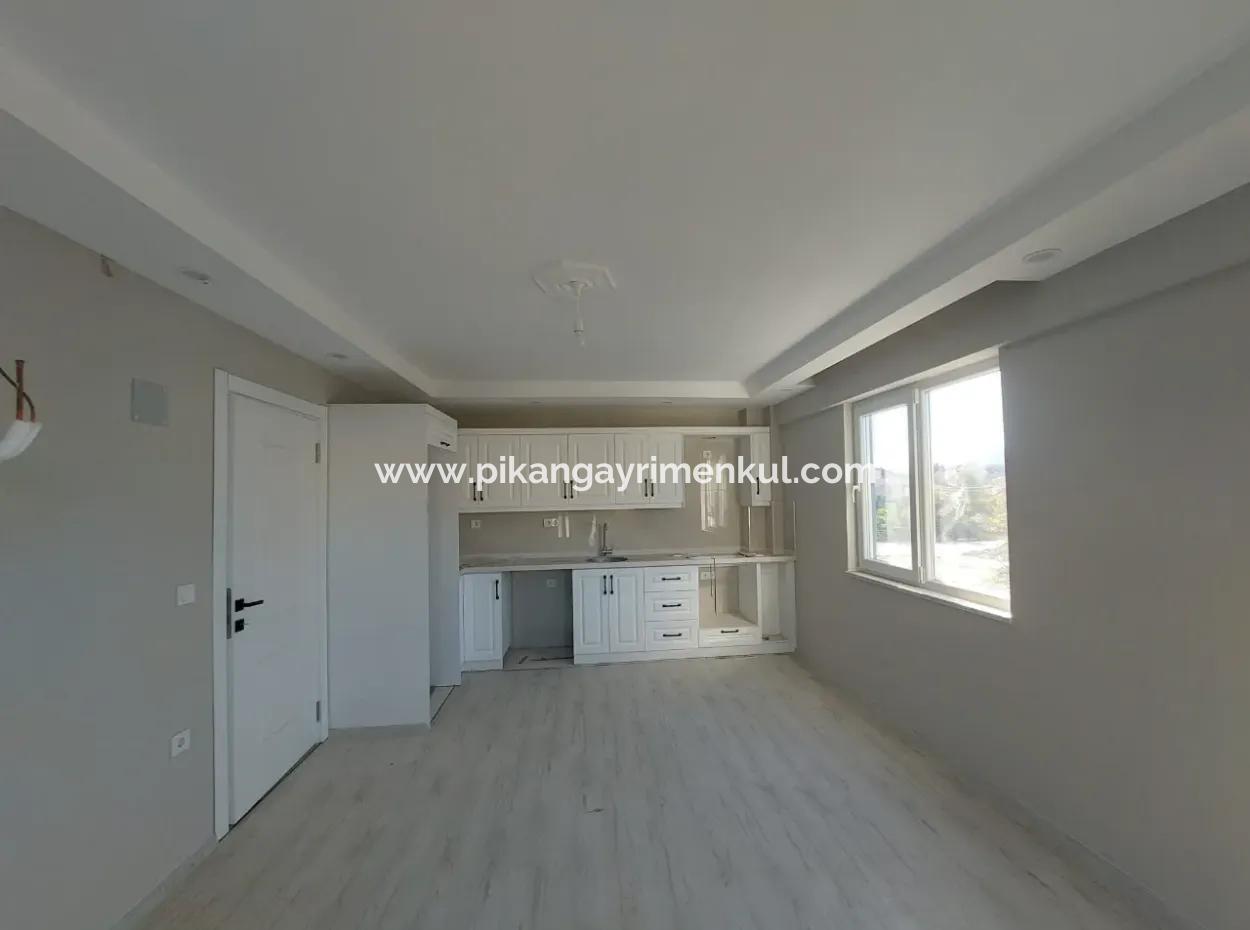 1 1 Flat Located On The Middle Floor Of A Brand New 3-Storey Building With A Swimming Pool In The Center Of Muğla Ortaca Is For Sale