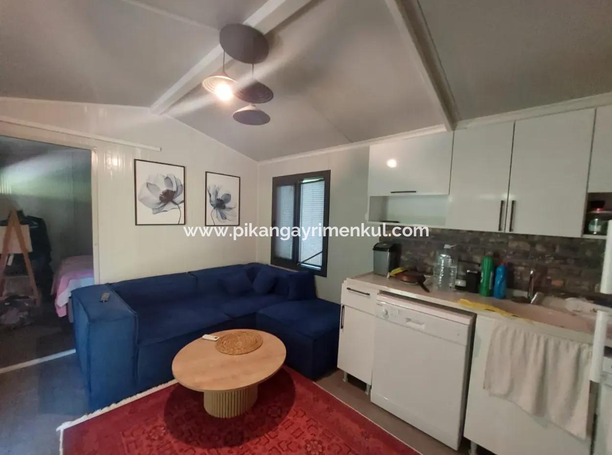 Ortaca Okçular’da 21 M² Eşyalı 1+1 Konteyner Ev – Yıllık Kiralık