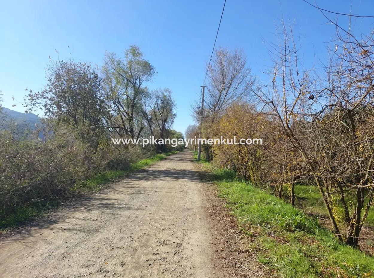 Ortaca  Okçular Da 1000 M2 Müstakil Arsa 250 M2 İnşaat Hakkı Olan Satılık Veya Ortaca Dan  2-3 Daire İle Takas Olur